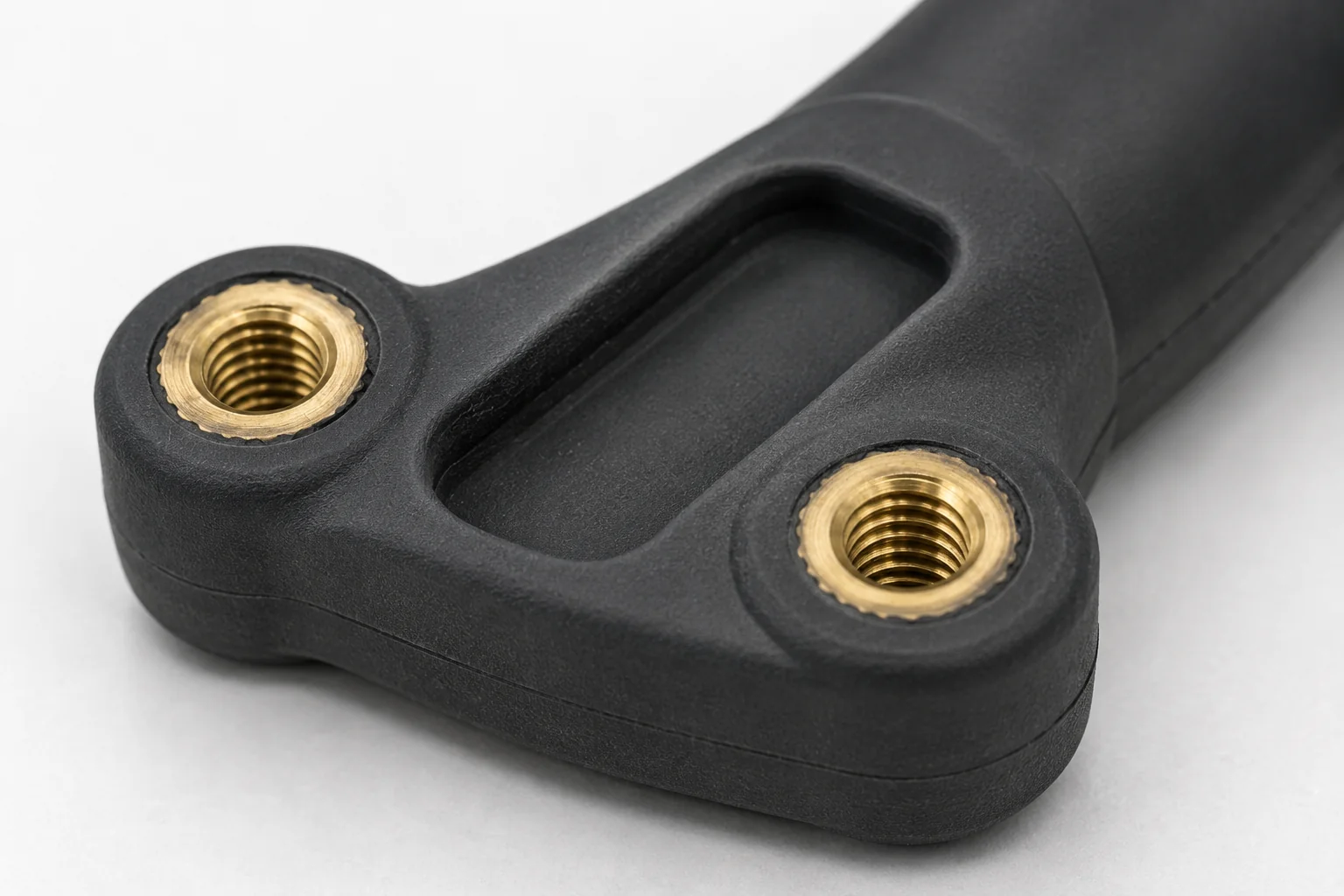 Insert molding with brass inserts